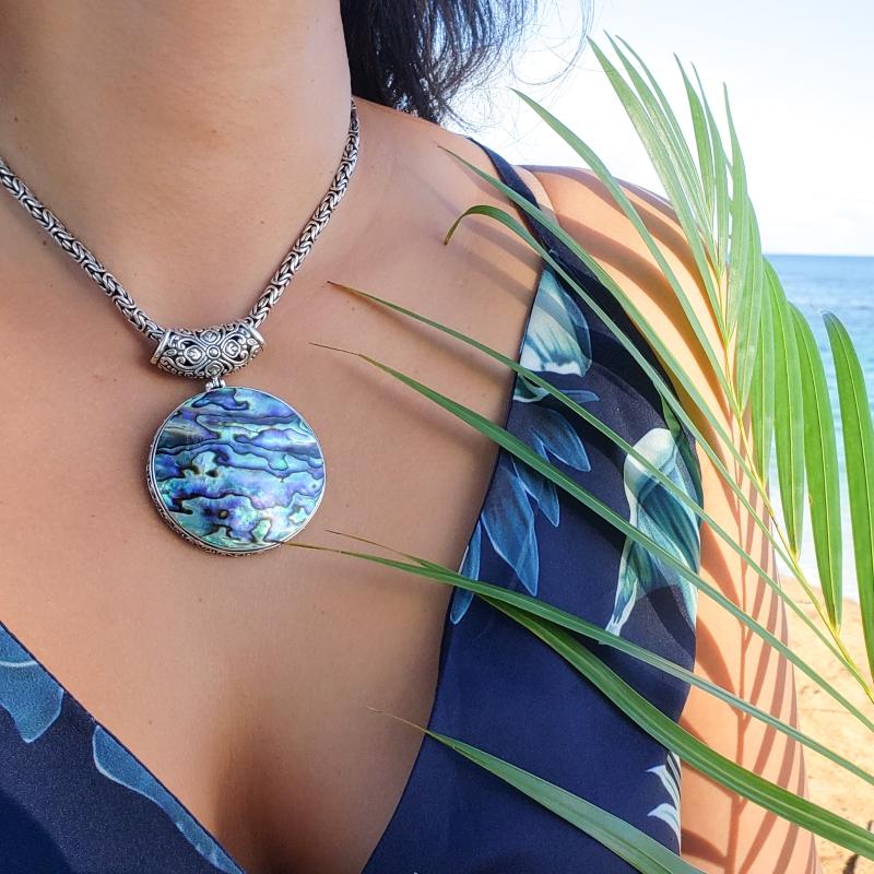 Handmade Sterling Silver Jewelry featuring natural Abalone Shell. It shimmers in striking blue, purple, green and pink colors and looks just like the ocean.