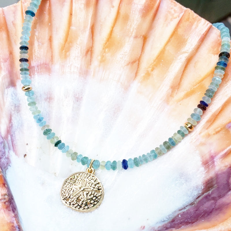 Roman Glass Necklace with Gold Sand Dollar