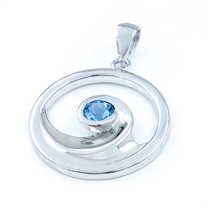 Sterling Silver Wave Pendant with Blue Topaz